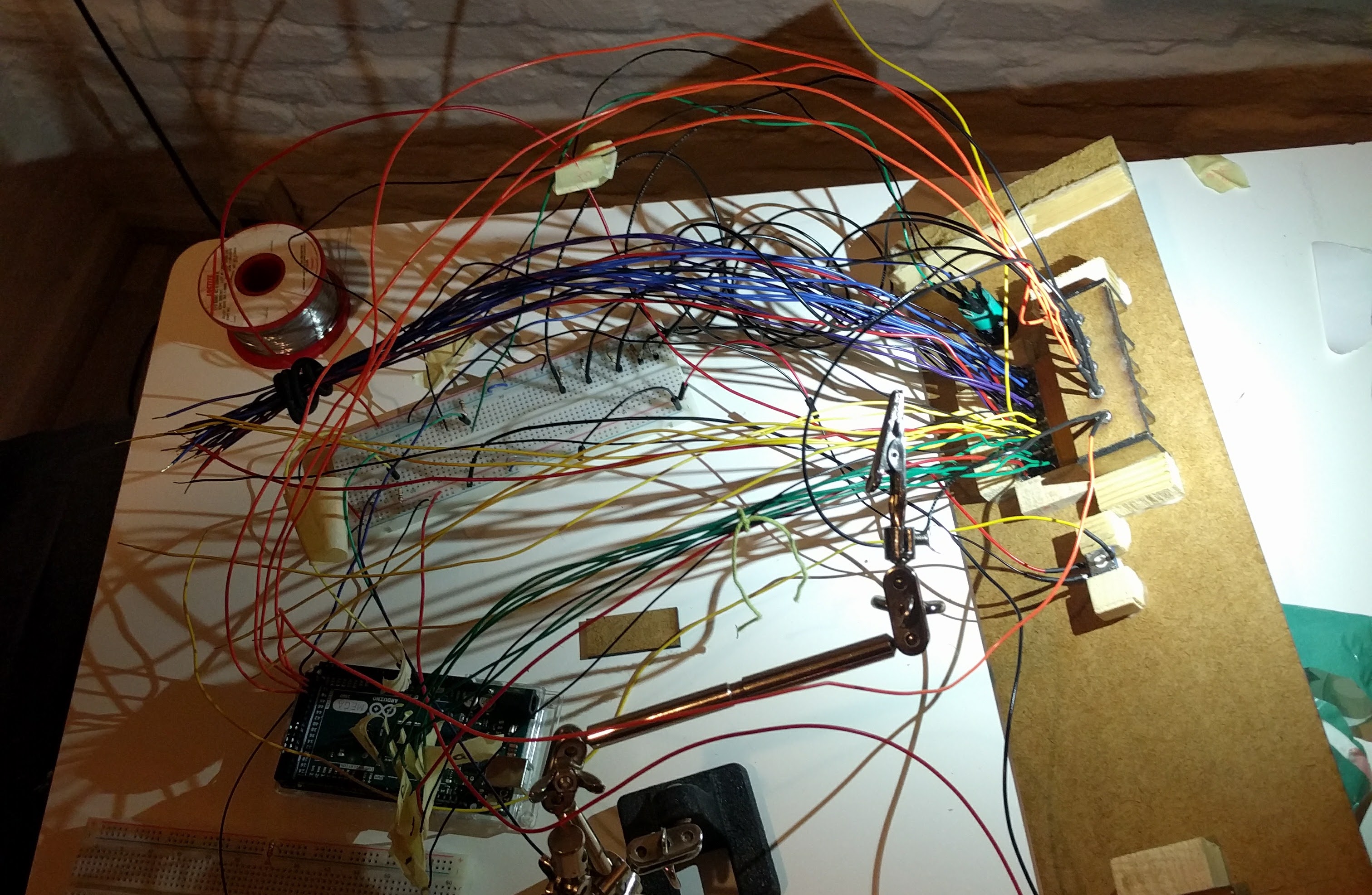 a rats nest of wires emerging from the faavi interface